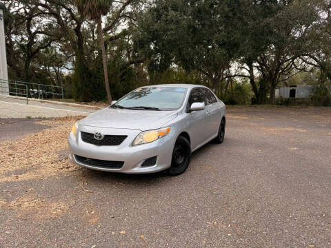 2009 Toyota Corolla for sale at Carnaval Auto Group LLC in Tampa FL