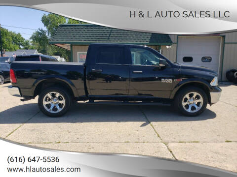 2014 RAM 1500 for sale at H & L AUTO SALES LLC in Wyoming MI