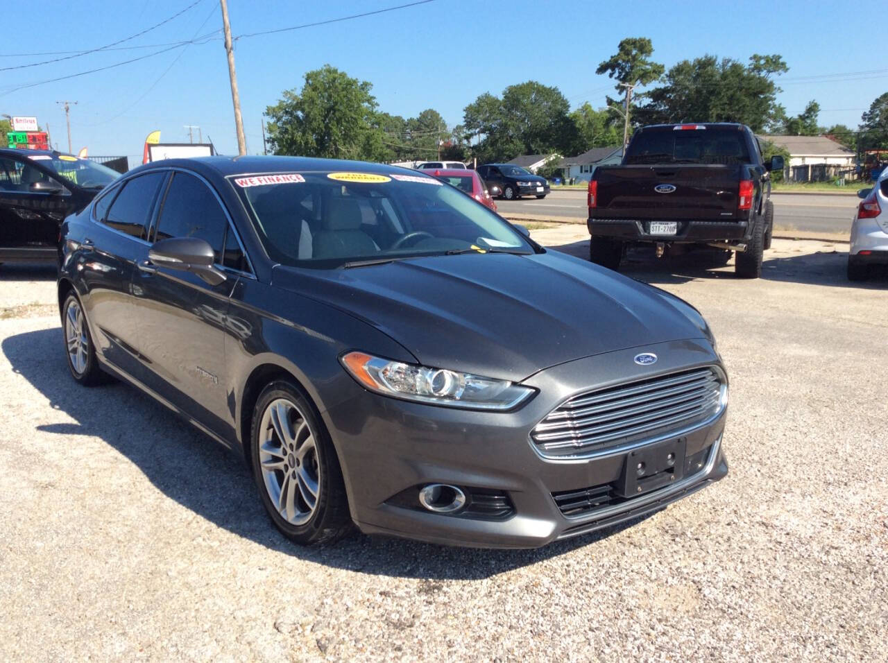 2015 Ford Fusion Hybrid for sale at SPRINGTIME MOTORS in Huntsville, TX