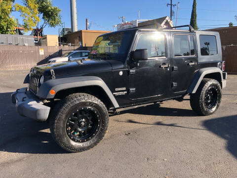 2015 Jeep Wrangler Unlimited for sale at C J Auto Sales in Riverbank CA