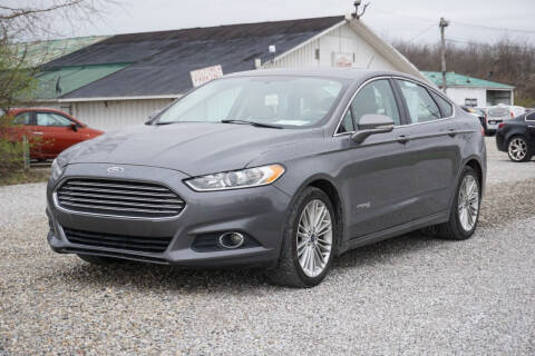 2014 Ford Fusion Hybrid for sale at Low Cost Cars in Circleville OH