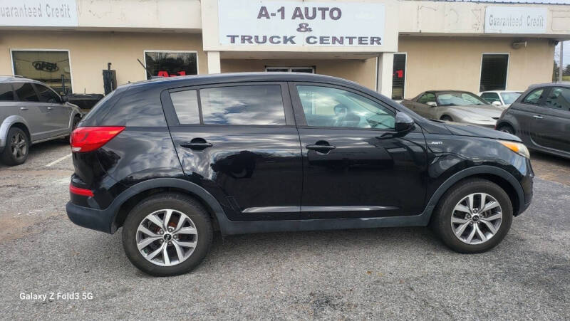 2016 Kia Sportage for sale at A-1 AUTO AND TRUCK CENTER in Memphis TN