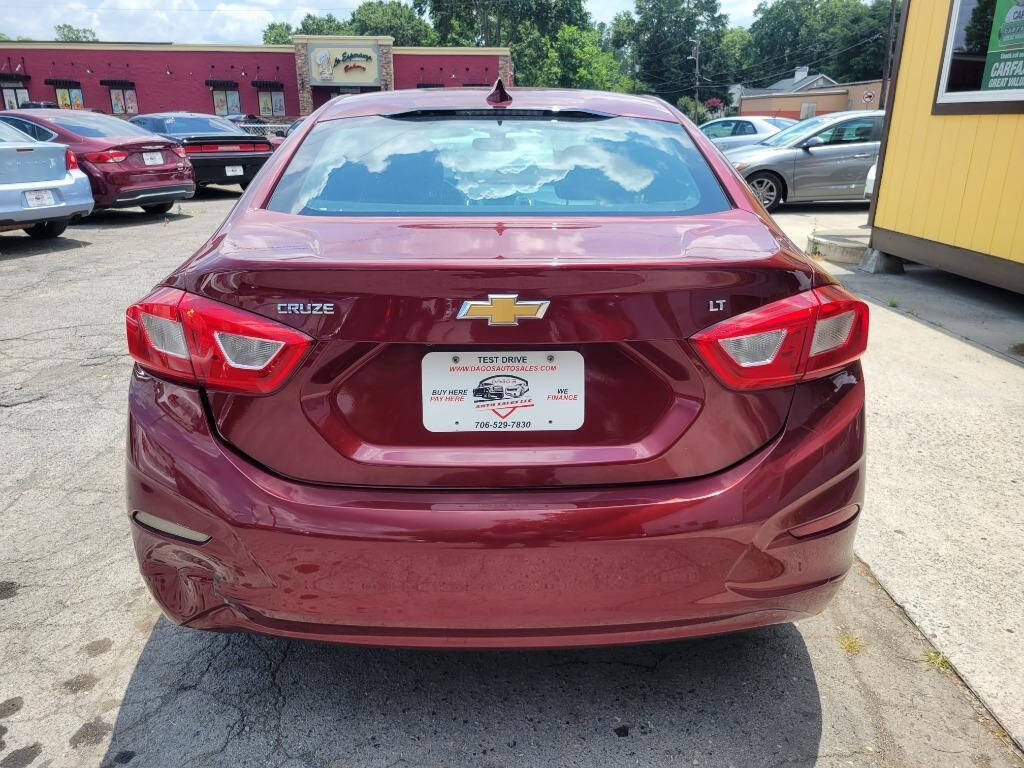 2016 Chevrolet Cruze for sale at DAGO'S AUTO SALES LLC in Dalton, GA