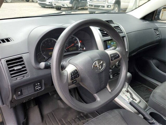 2013 Toyota Corolla for sale at Bowman Auto Center in Clarkston, MI