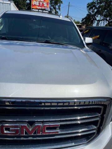 2015 GMC Yukon for sale at Rey's Auto Sales in Stockton CA