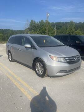 2014 Honda Odyssey for sale at LEE'S USED CARS INC in Ashland KY