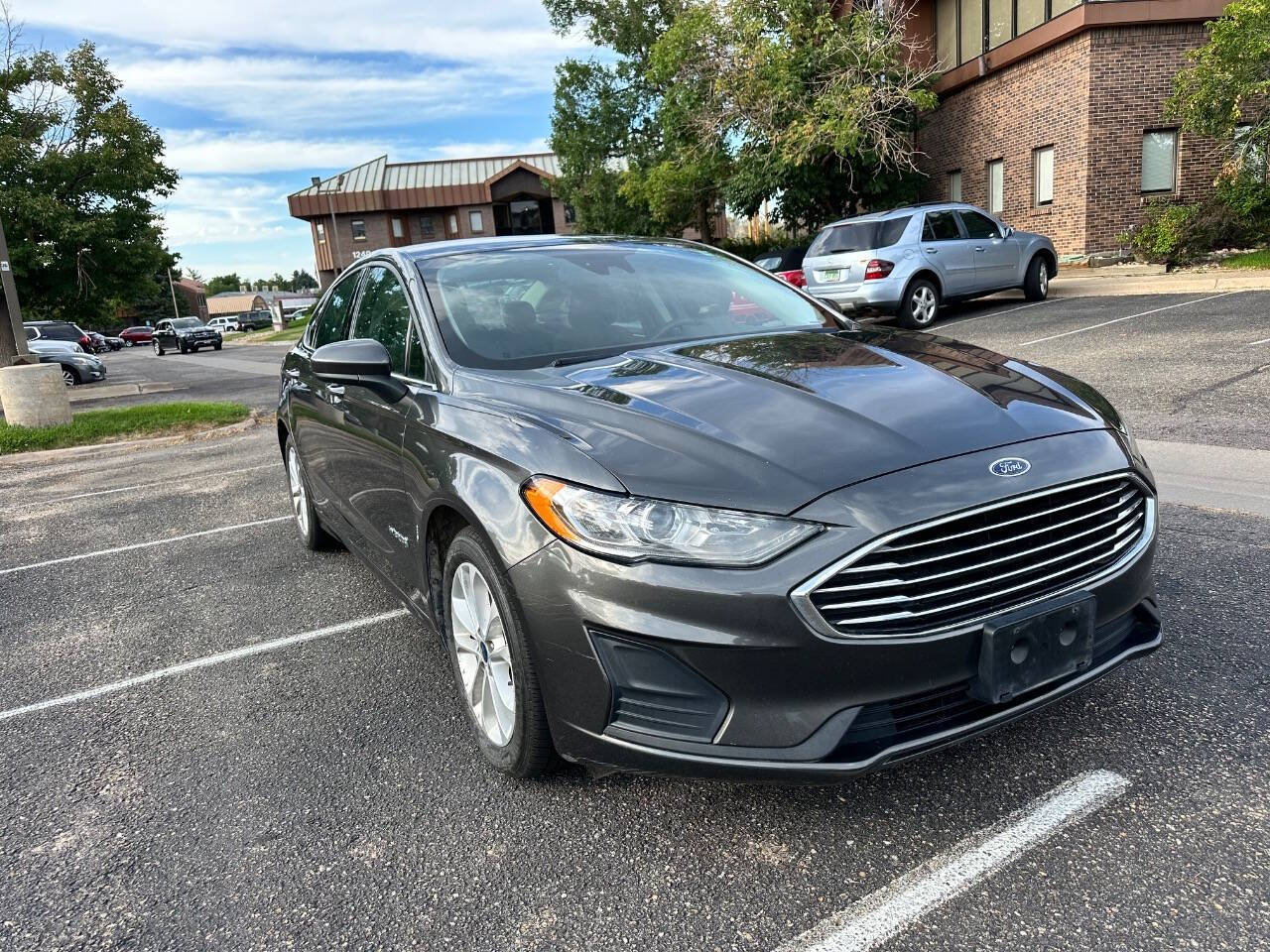 2019 Ford Fusion Hybrid for sale at AMZ Autos, LLC in Denver, CO