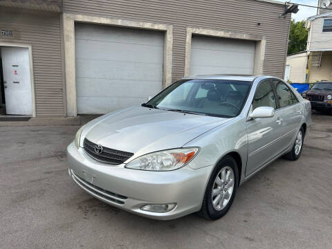 2004 Toyota Camry for sale at Global Auto Finance & Lease INC in Maywood IL