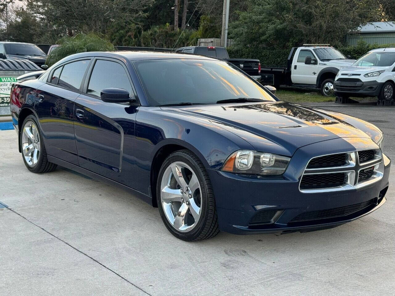 2014 Dodge Charger for sale at DJA Autos Center in Orlando, FL