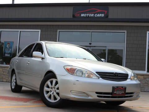 2002 Toyota Camry for sale at CK MOTOR CARS in Elgin IL