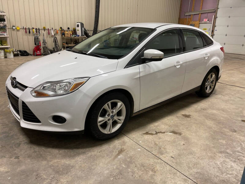 2013 Ford Focus for sale at J & K AUTO SALES LLC in Holland MI