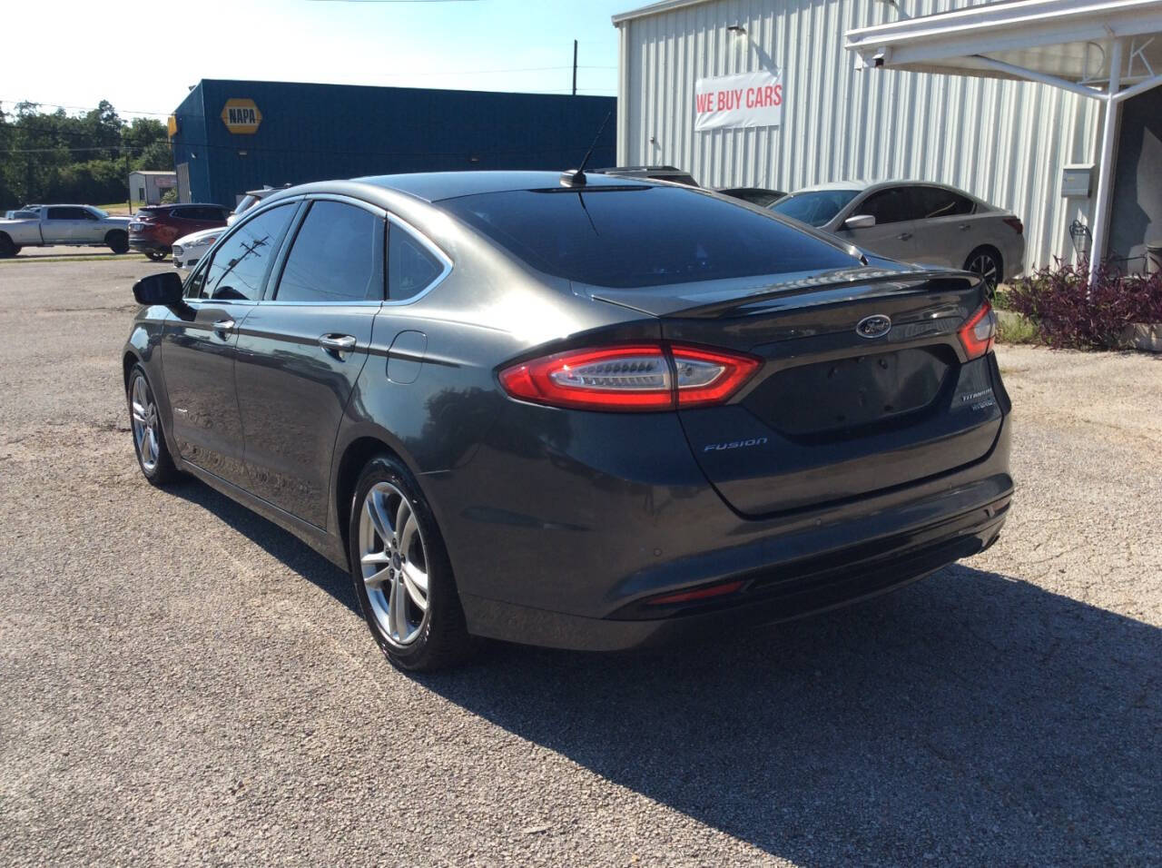 2015 Ford Fusion Hybrid for sale at SPRINGTIME MOTORS in Huntsville, TX