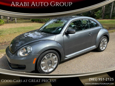 2012 Volkswagen Beetle for sale at Arabi Auto Group in Lacombe LA