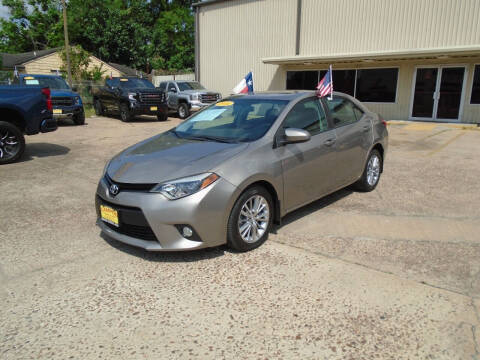 2014 Toyota Corolla for sale at Campos Trucks & SUVs, Inc. in Houston TX