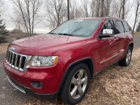 2011 Jeep Grand Cherokee for sale at BELOW BOOK AUTO SALES in Idaho Falls ID