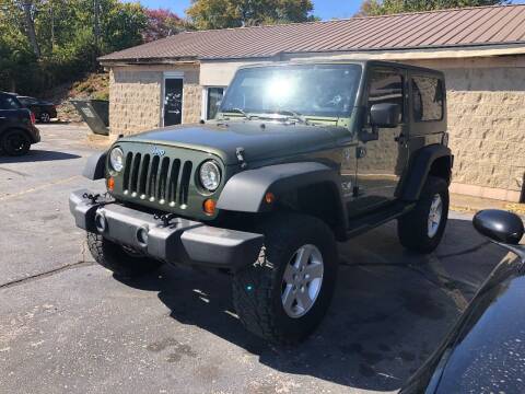 2009 Jeep Wrangler for sale at Butler's Automotive in Henderson KY