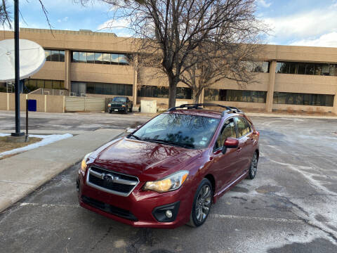 2013 Subaru Impreza for sale at QUEST MOTORS in Englewood CO