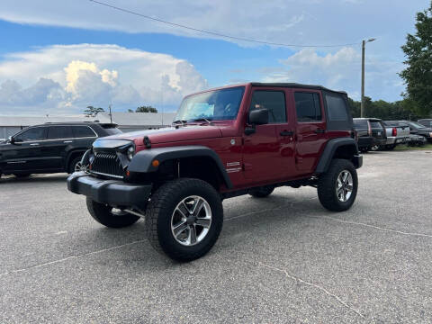 2012 Jeep Wrangler Unlimited for sale at CarWorx LLC in Dunn NC