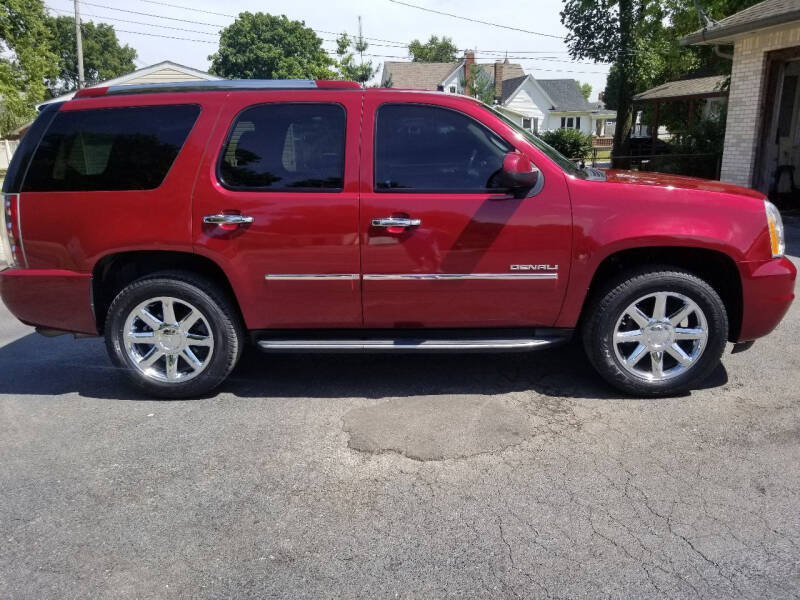 2011 GMC Yukon for sale at MADDEN MOTORS INC in Peru IN