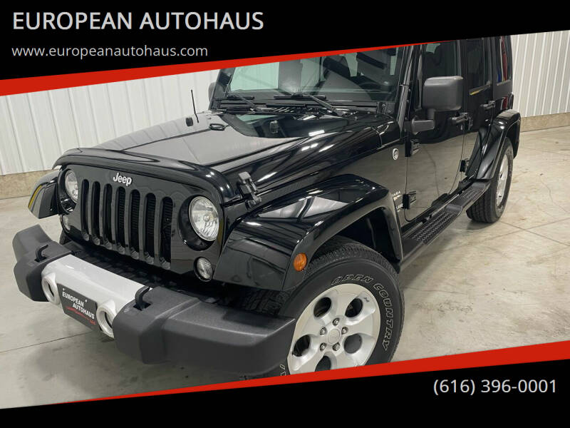 2014 Jeep Wrangler Unlimited for sale at EUROPEAN AUTOHAUS in Holland MI