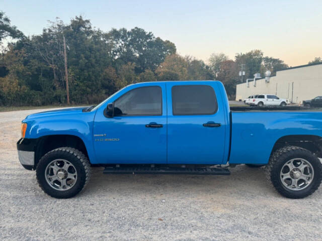 2013 GMC Sierra 2500HD for sale at Guadalupe Auto Sales, LLC. in Jemison, AL