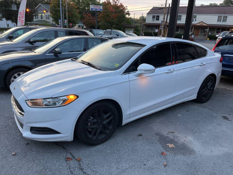 2015 Ford Fusion for sale at Apple Auto Sales Inc in Camillus NY