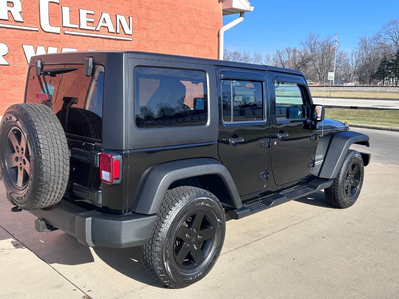 2014 Jeep Wrangler Unlimited for sale at Illinois Auto Wholesalers in Tolono, IL