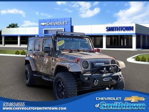 2015 Jeep Wrangler Unlimited for sale at CHEVROLET OF SMITHTOWN in Saint James NY