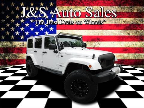 2014 Jeep Wrangler Unlimited for sale at J & S Auto Sales in Clarksville TN