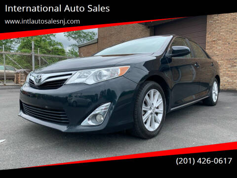 2014 Toyota Camry for sale at International Auto Sales in Hasbrouck Heights NJ
