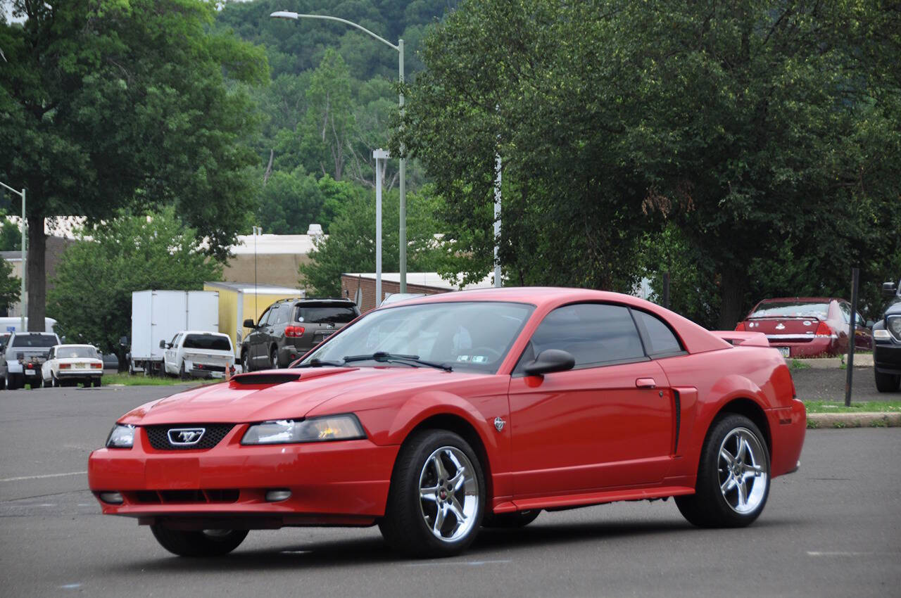 Red 1999 Ford Mustang Coupe Rear-Wheel Drive 5-Speed Manual