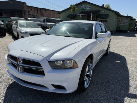 2014 Dodge Charger for sale at Velocity Autos in Winter Park FL