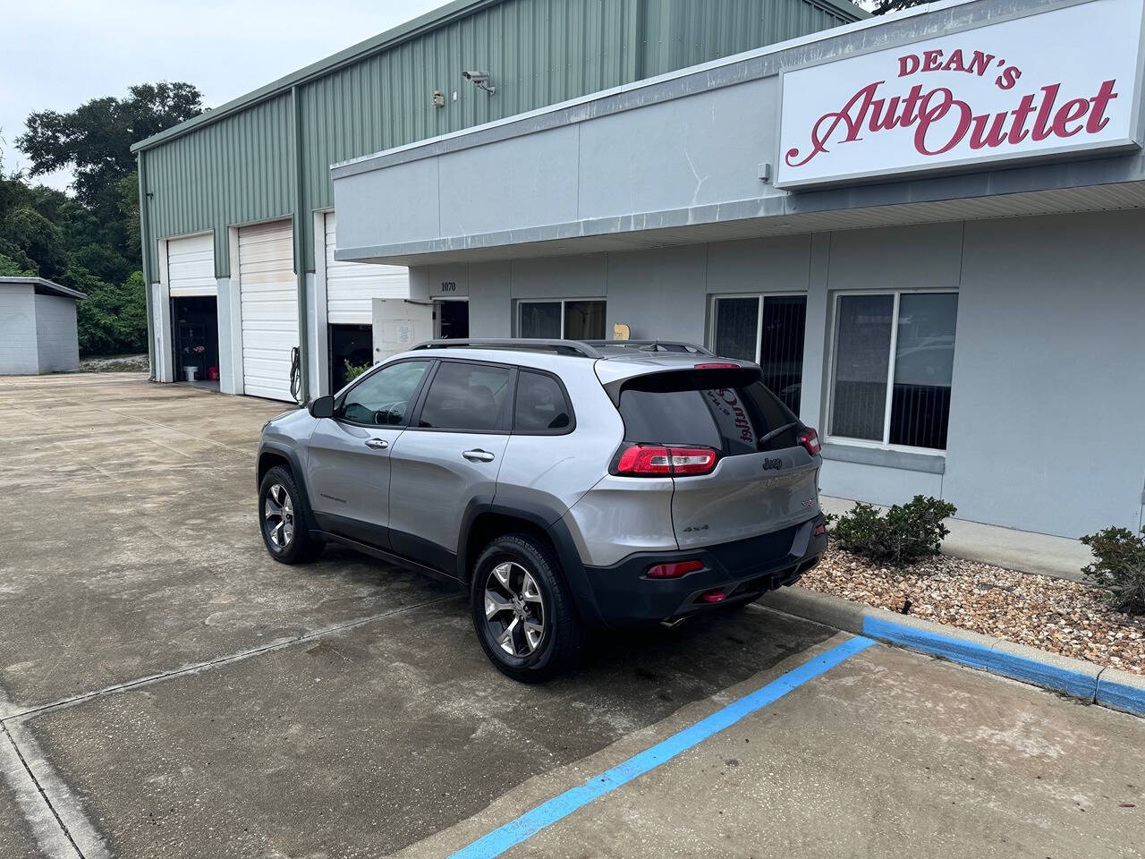 2014 Jeep Cherokee for sale at Deans Auto Outlet in Ormond Beach, FL