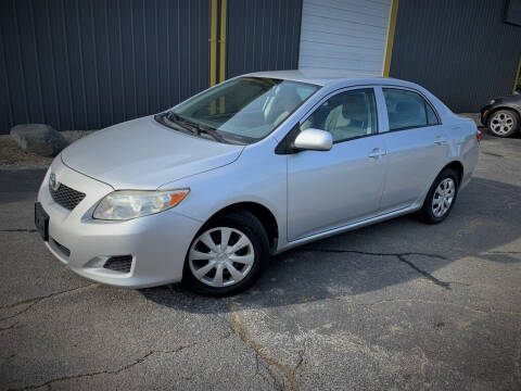 2009 Toyota Corolla for sale at Queen City Auto House LLC in West Chester OH