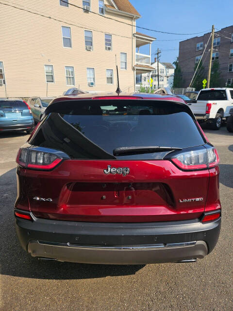 2019 Jeep Cherokee for sale at RENOS AUTO SALES LLC in Waterbury, CT