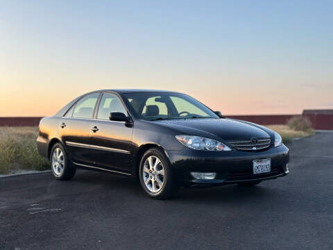 2006 Toyota Camry for sale at BARMAN AUTO INC in Bakersfield CA