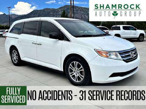 2012 Honda Odyssey for sale at Shamrock Group LLC #1 - Passenger Vans in Pleasant Grove UT