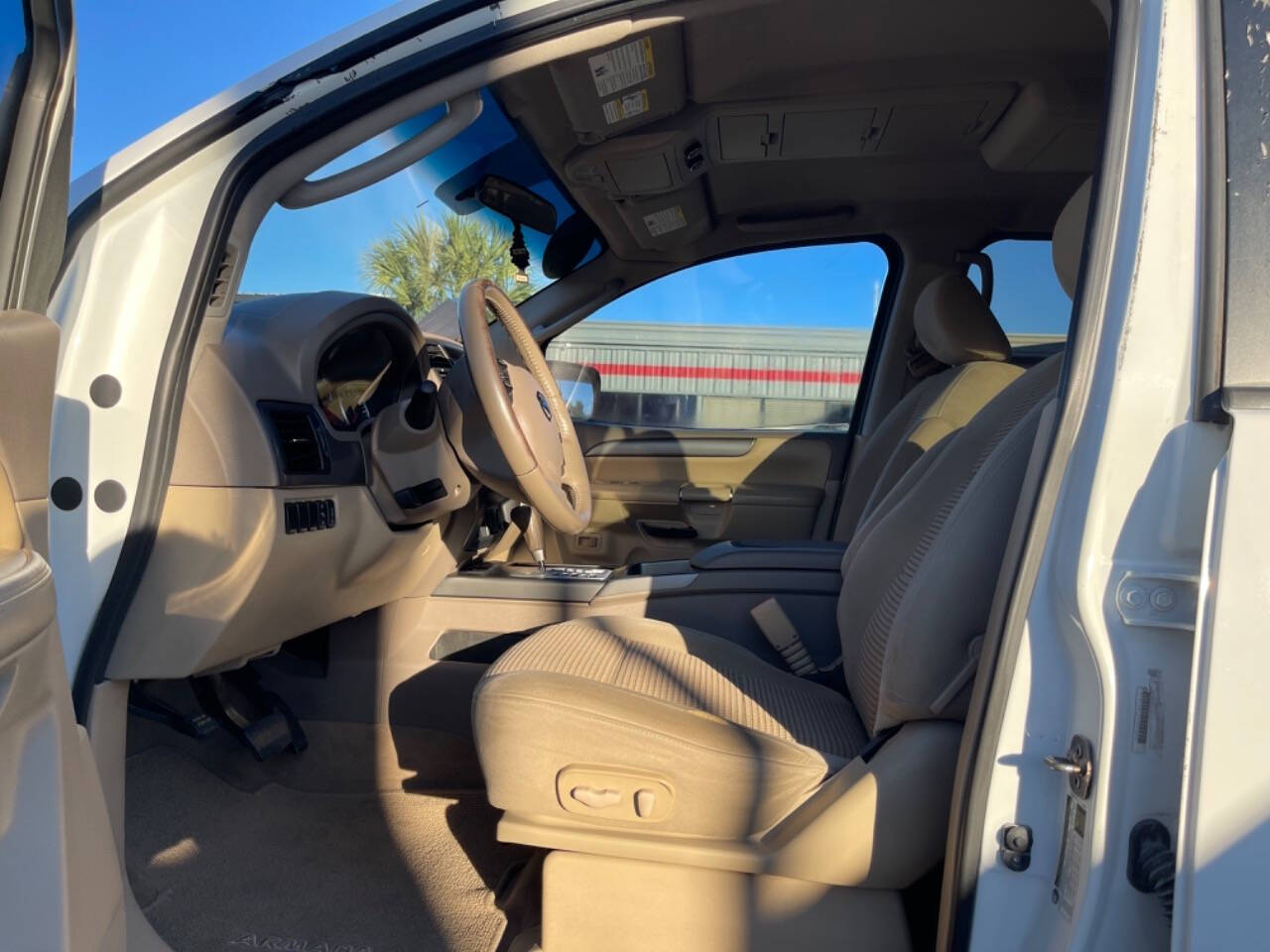 2012 Nissan Armada for sale at SMART CHOICE AUTO in Pasadena, TX