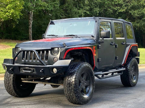 2012 Jeep Wrangler Unlimited for sale at Top Notch Luxury Motors in Decatur GA