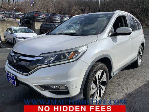 2016 Honda CR-V for sale at J & M Automotive in Naugatuck CT