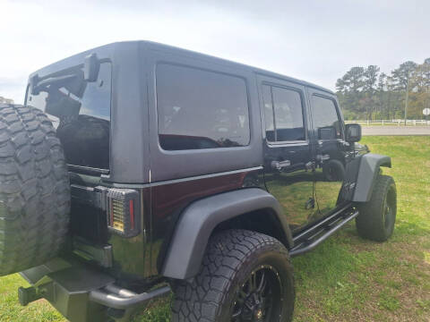 2011 Jeep Wrangler Unlimited for sale at Kelton Collins Motors 2 in Boaz AL