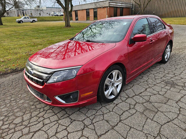 2011 Ford Fusion for sale at WAGNER AUTO MART LLC in Ann Arbor, MI