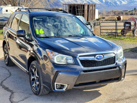 2016 Subaru Forester for sale at FRESH TREAD AUTO LLC in Spanish Fork UT