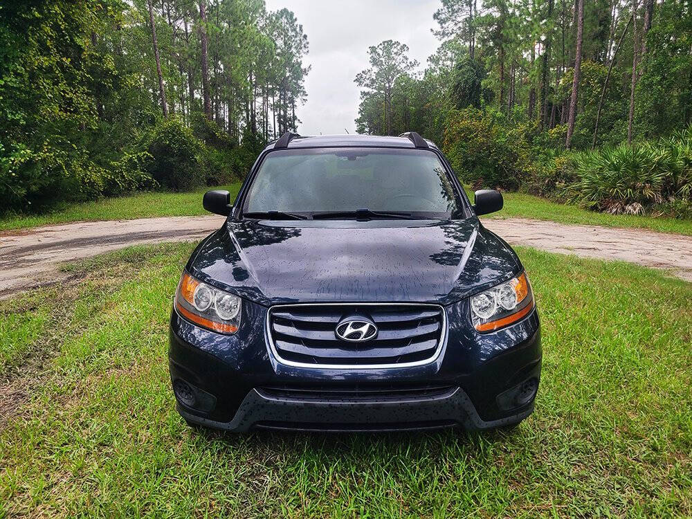 2011 Hyundai SANTA FE for sale at Flagler Auto Center in Bunnell, FL