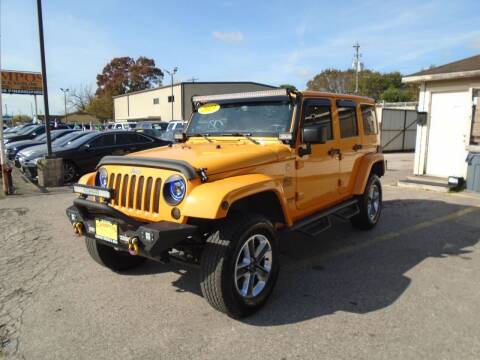 2013 Jeep Wrangler Unlimited for sale at Campos Trucks & SUVs, Inc. in Houston TX
