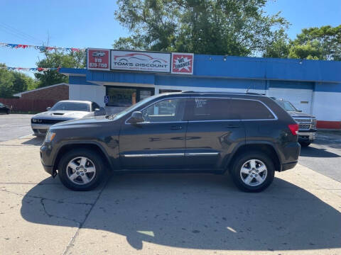 2011 Jeep Grand Cherokee for sale at Tom's Discount Auto Sales in Flint MI