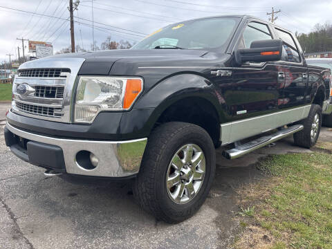 2013 Ford F-150 for sale at WINNERS CIRCLE AUTO EXCHANGE in Ashland KY