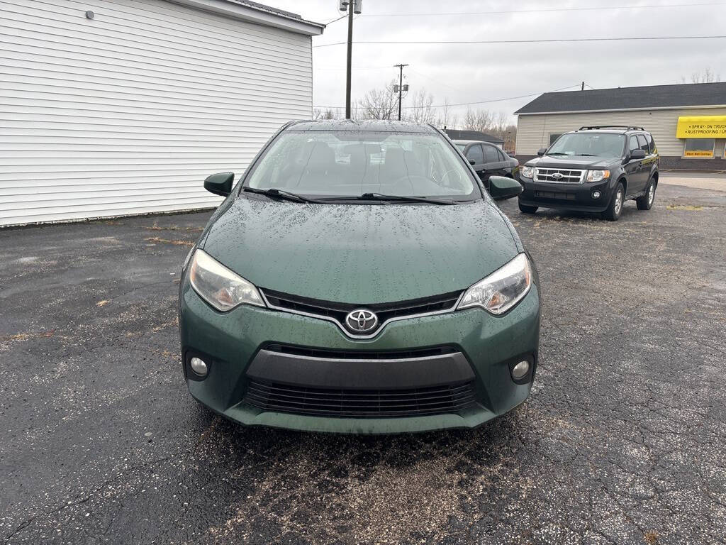 2015 Toyota Corolla for sale at DECKER AUTO SALES in Bay City, MI