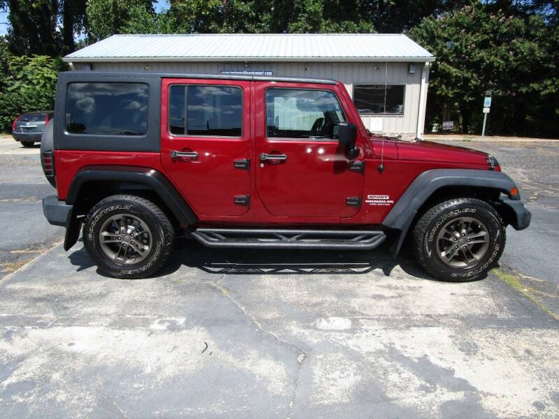 2012 Jeep Wrangler Unlimited for sale at Taylorsville Auto Mart in Taylorsville NC