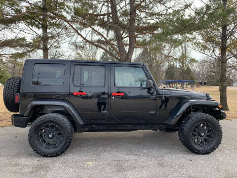 2010 Jeep Wrangler Unlimited for sale at A & J AUTO SALES in Eagle Grove IA